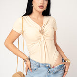 Body Manga Corta Con Flor Metalica color Beige | ZAIVA